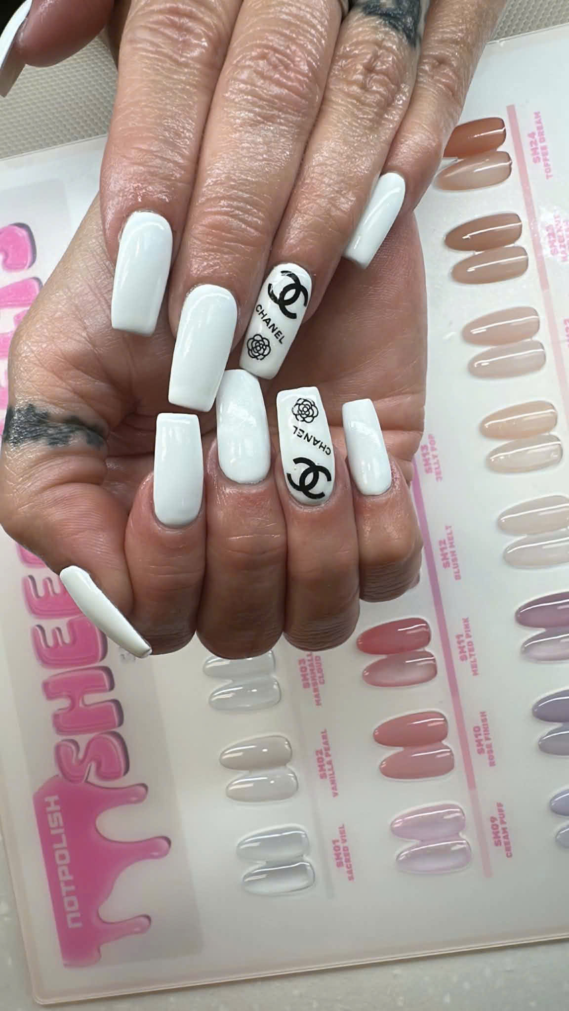 White logo nails portrait