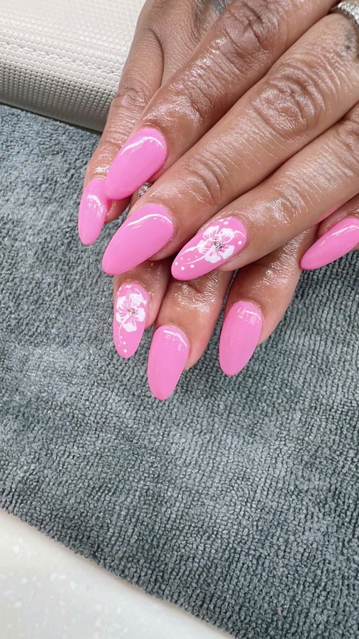 Pink floral nails close-up