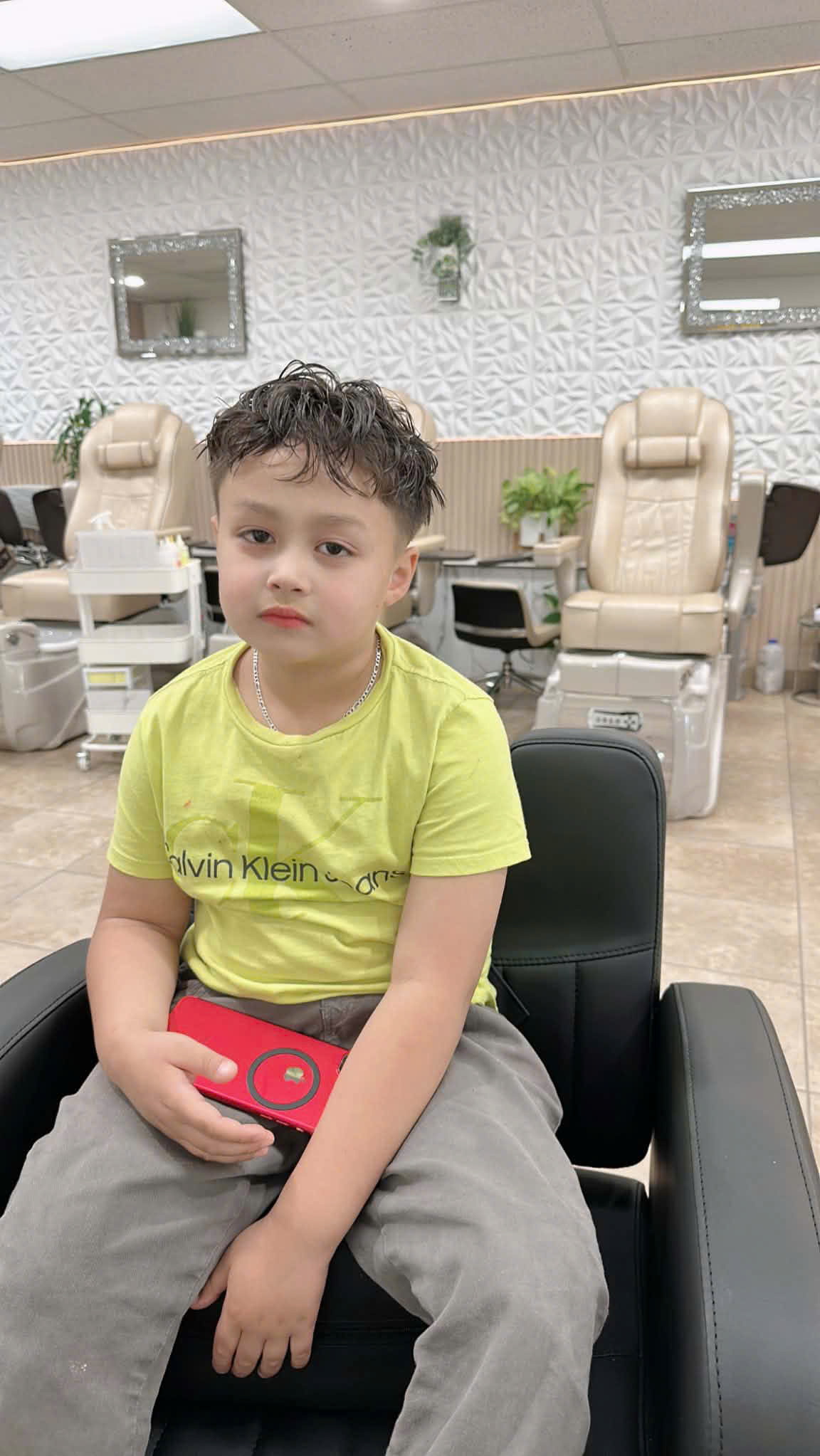 Kid's haircut seated portrait