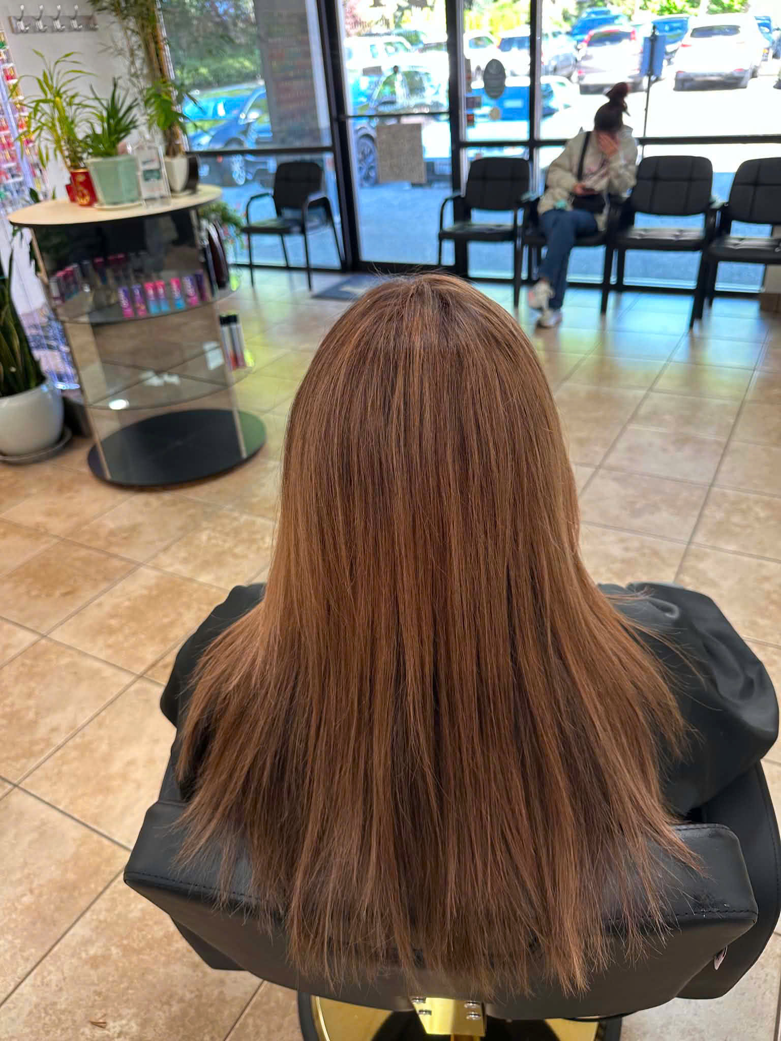 Long smooth hair at the salon chair