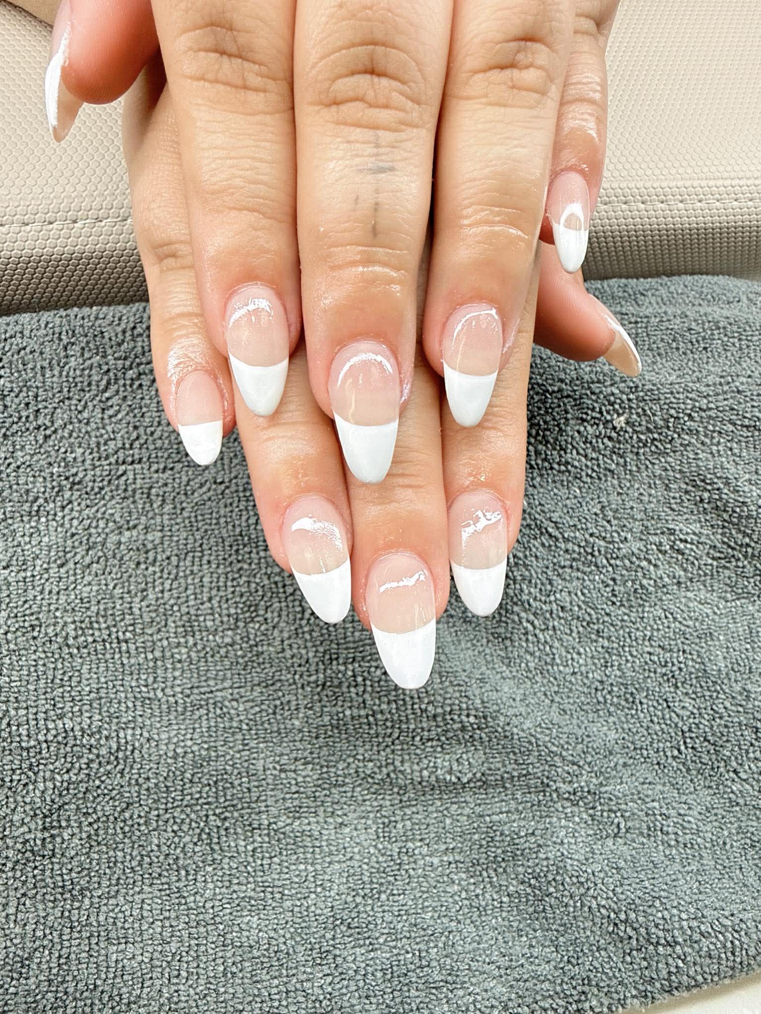 White French tip nail close-up