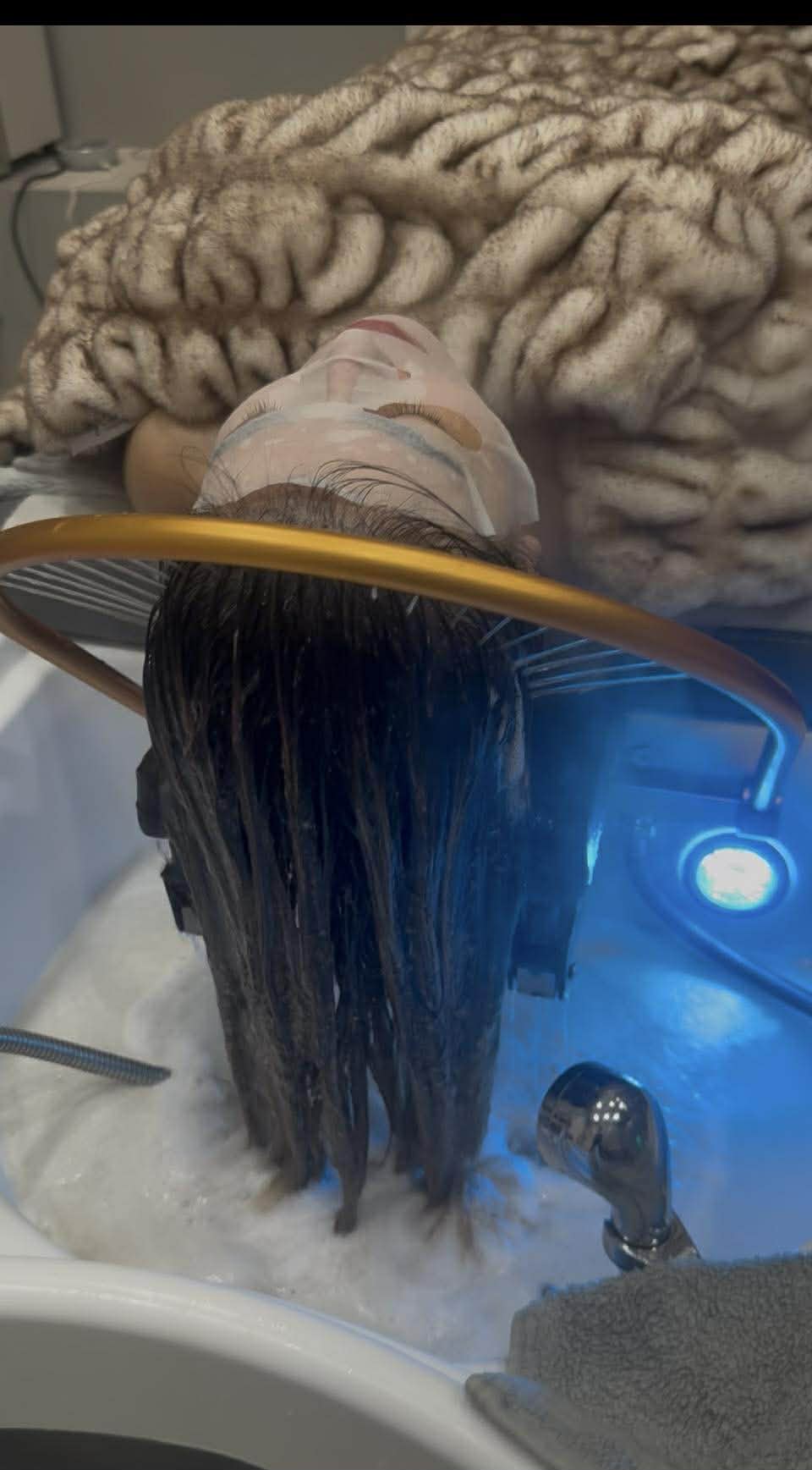 Head spa experience with blue light therapy