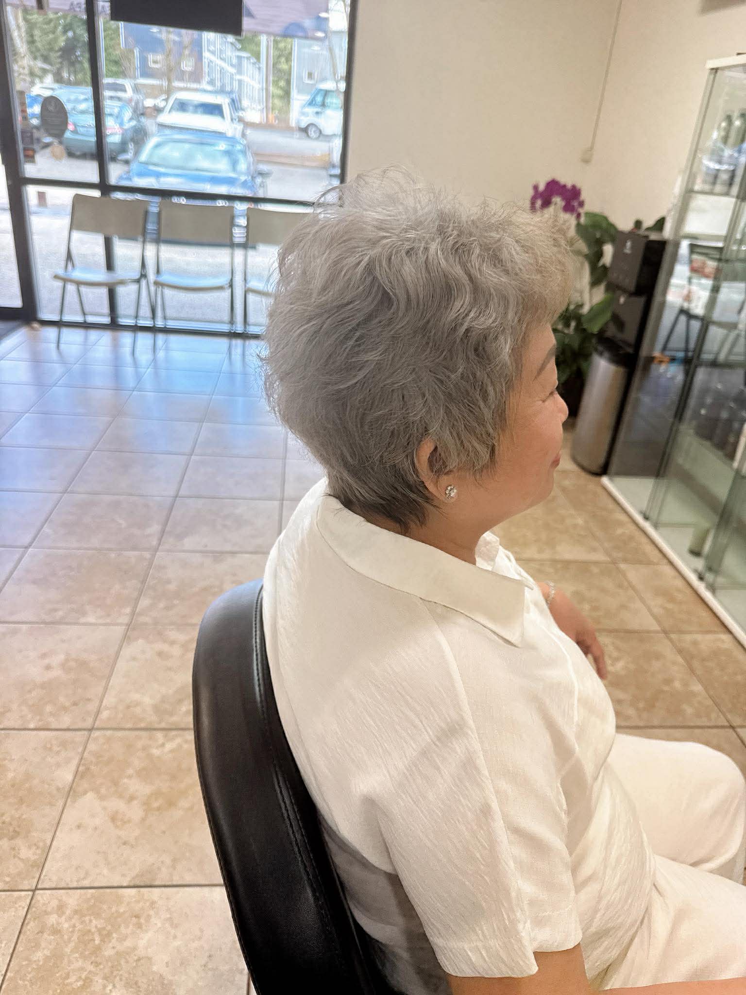 Soft silver haircut from the side